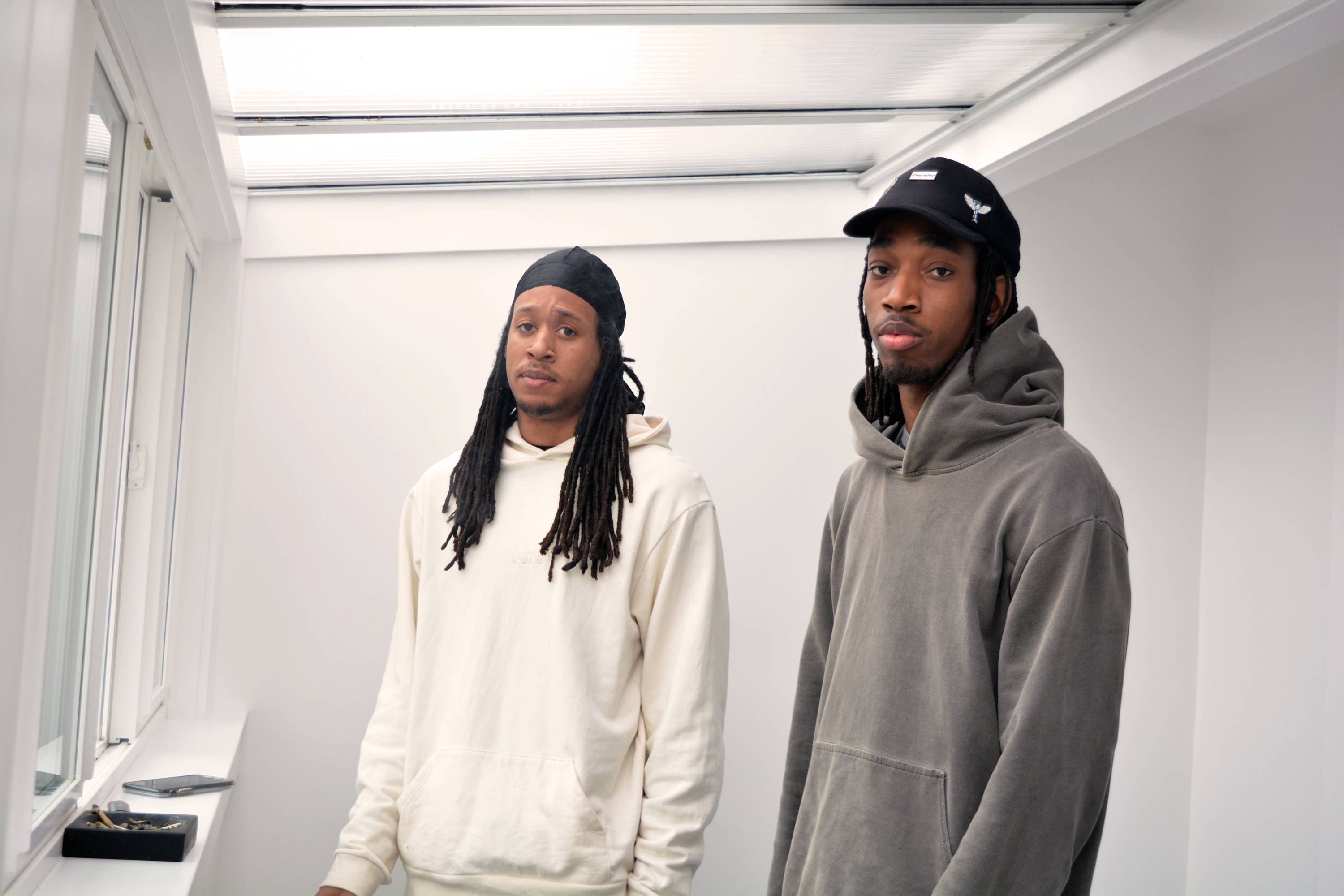 A photo of Shyeem Ambrose on the left and Hakeem Crooks on the right posing for their Black History Month Interview.
