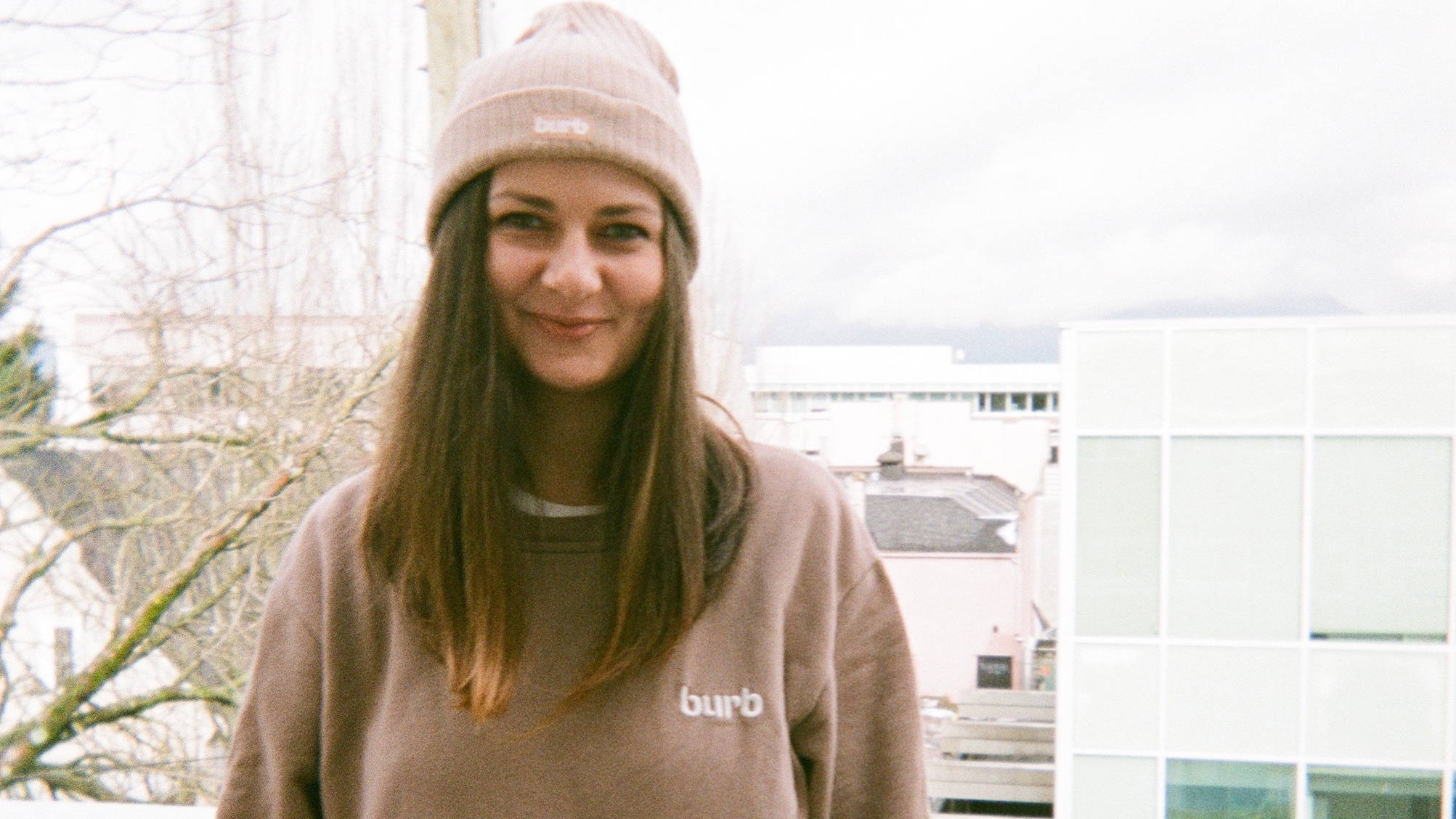 A photo of our Retail Operations Specialist, Jenny at our East Vancouver Burb office.