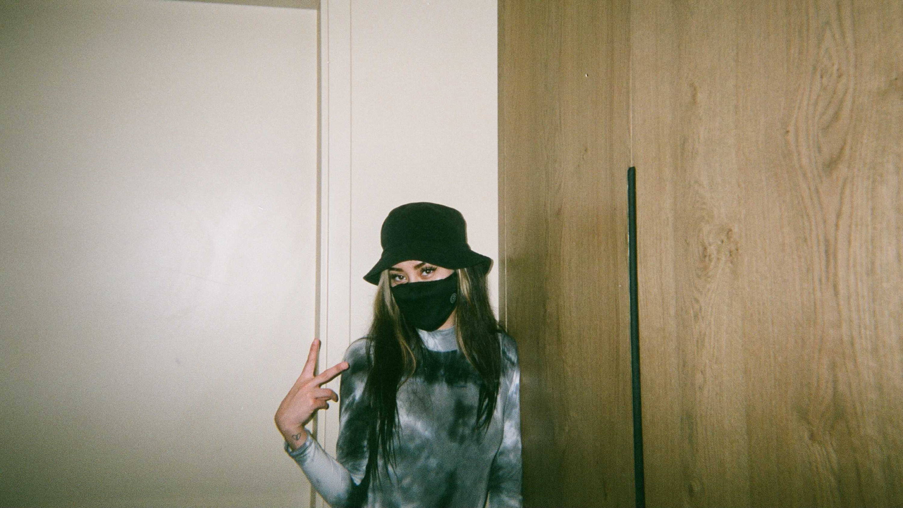 A photo of one of our Burbtenders showing the peace sign.