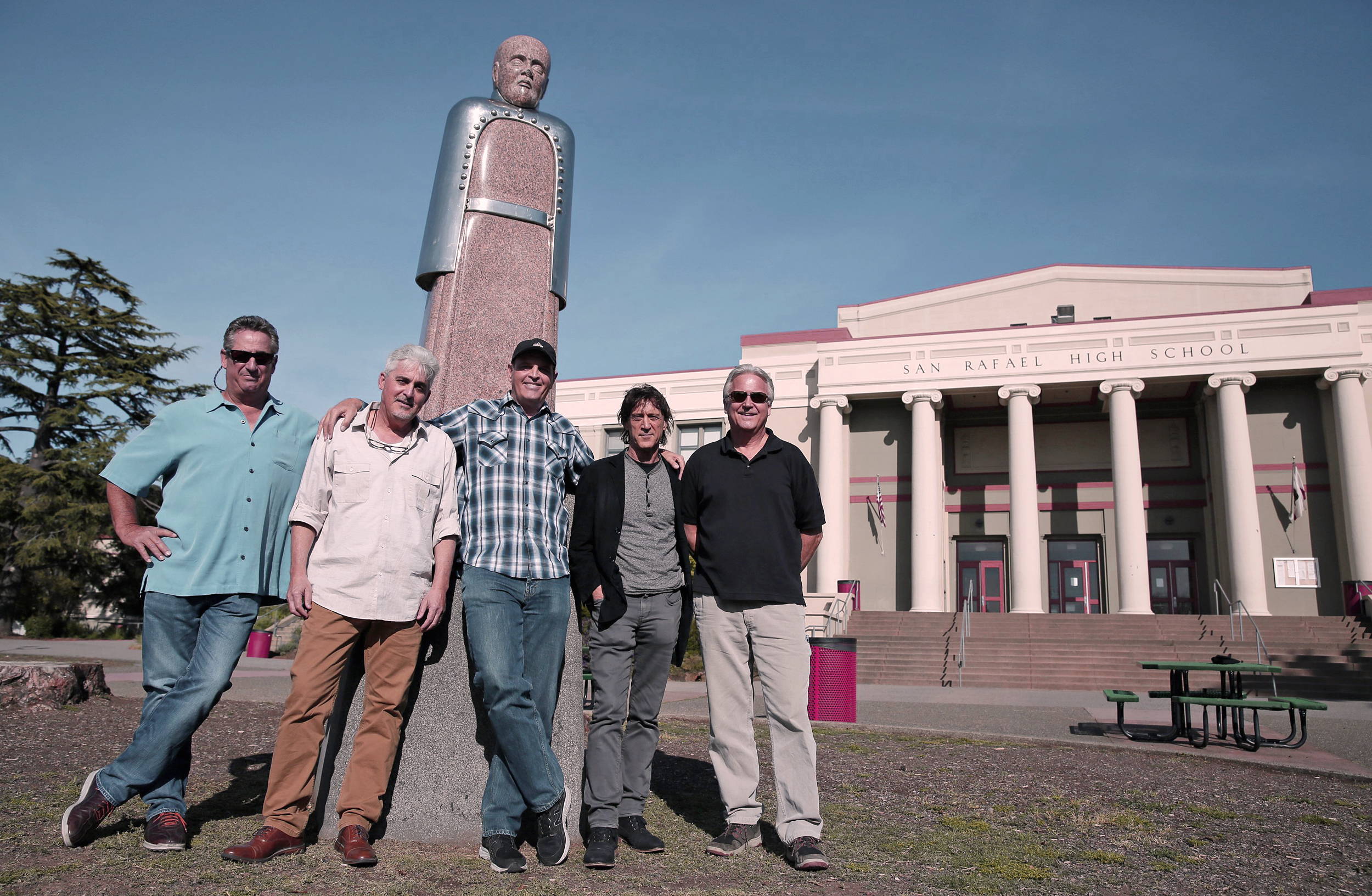 A photo of the original Waldos outside their high school in San Rafael, California.