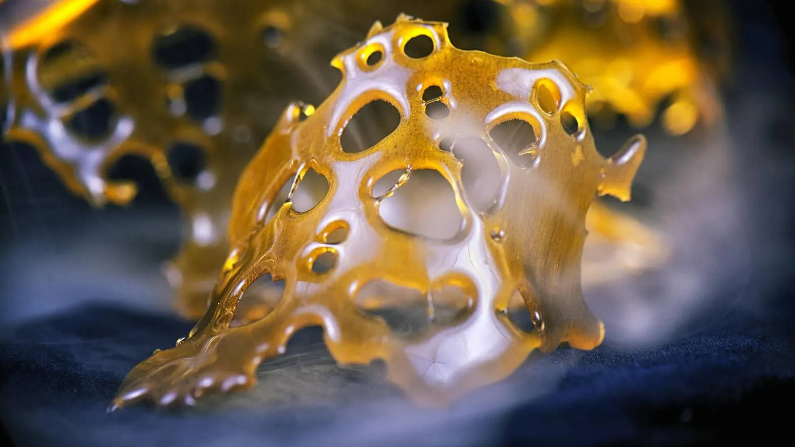 A close up photo of the cannabis extract called shatter.